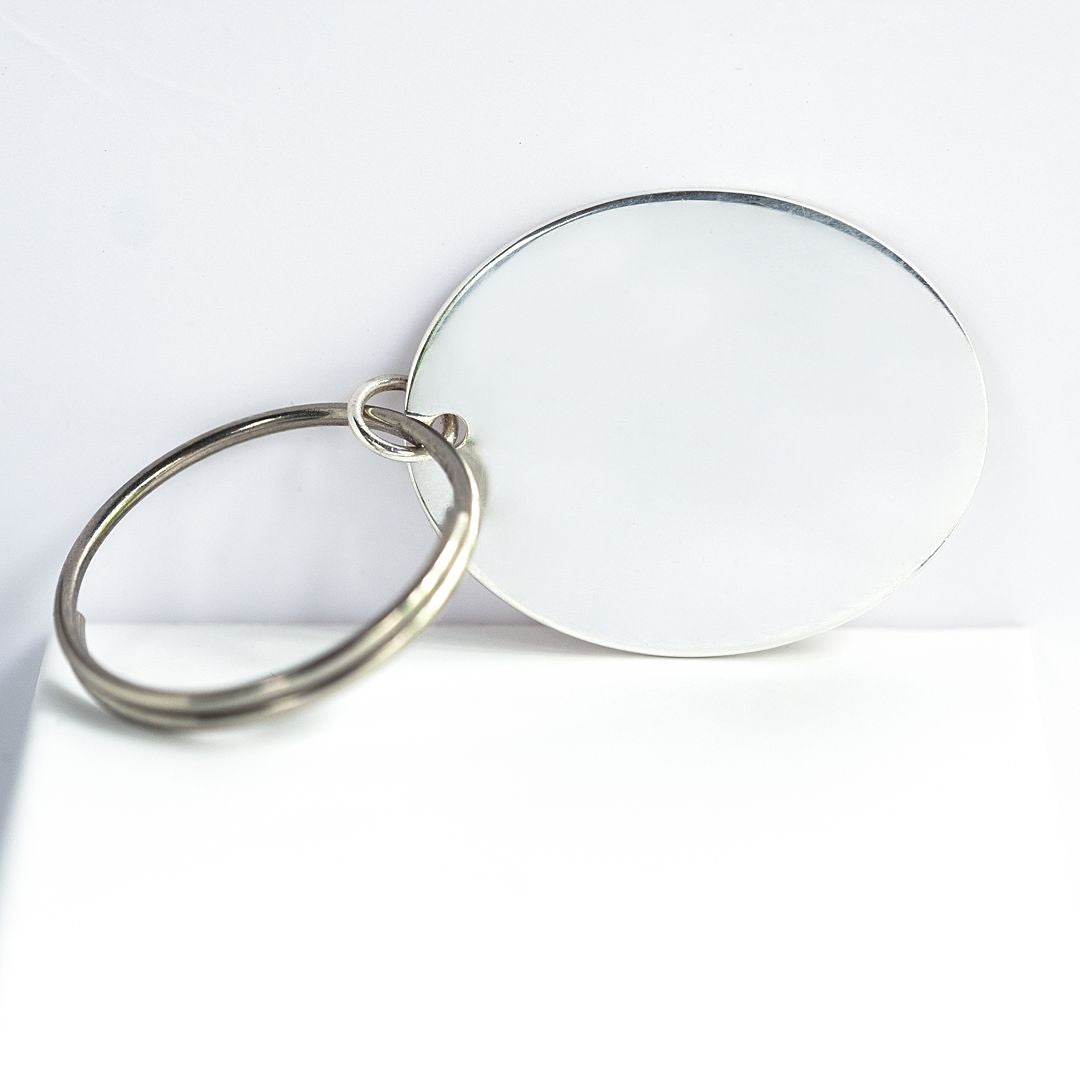 Porte-clés ovale en argent sterling