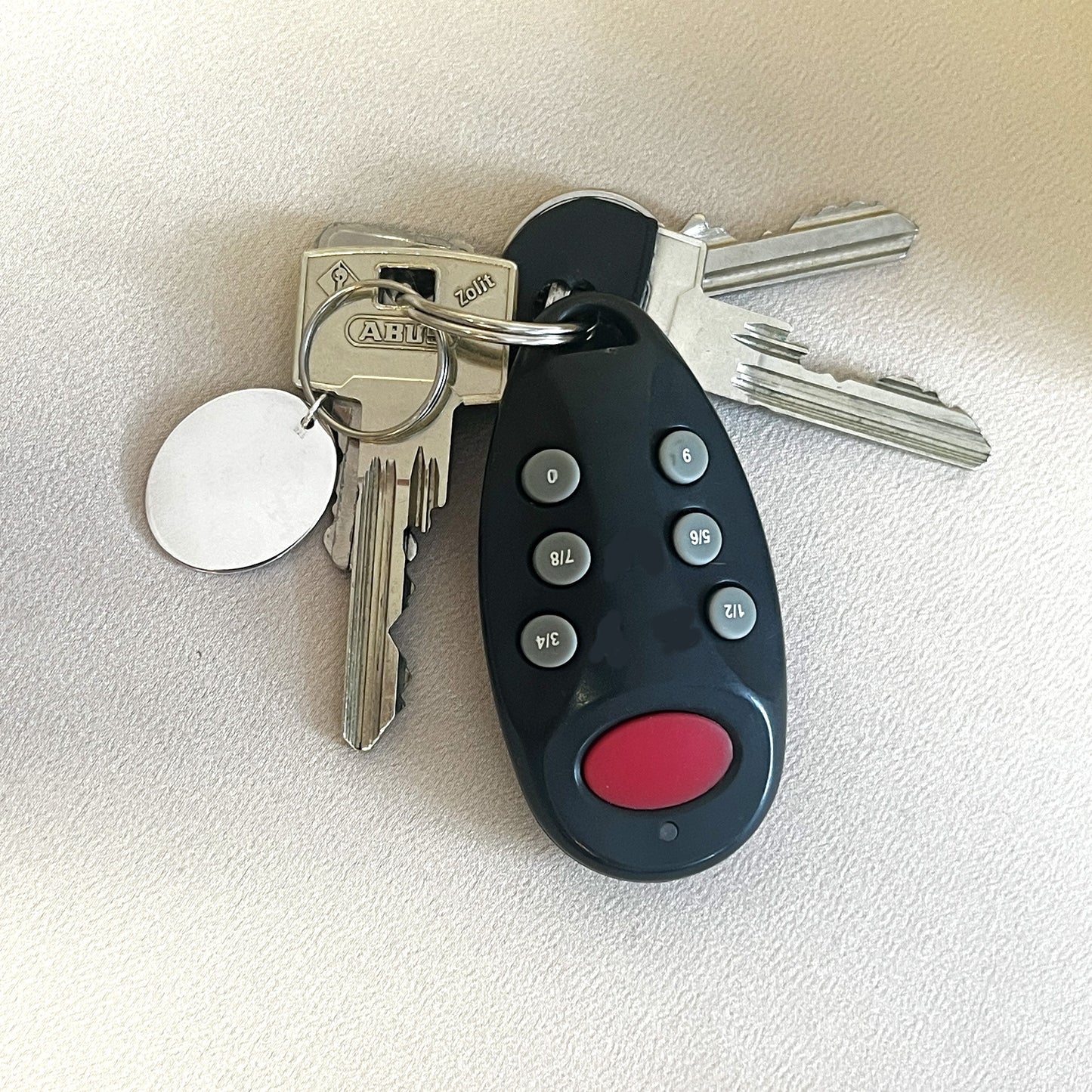 Porte-clés ovale en argent sterling