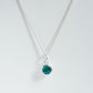 Blue zircon charm pendant