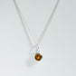 Topaz charm pendant