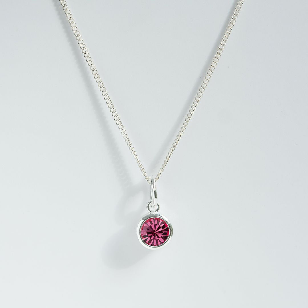 Silver rose charm pendant