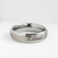 Tungsten ring engraved with the name 'Cillian'