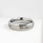 Tungsten ring engraved with the name 'Molly'
