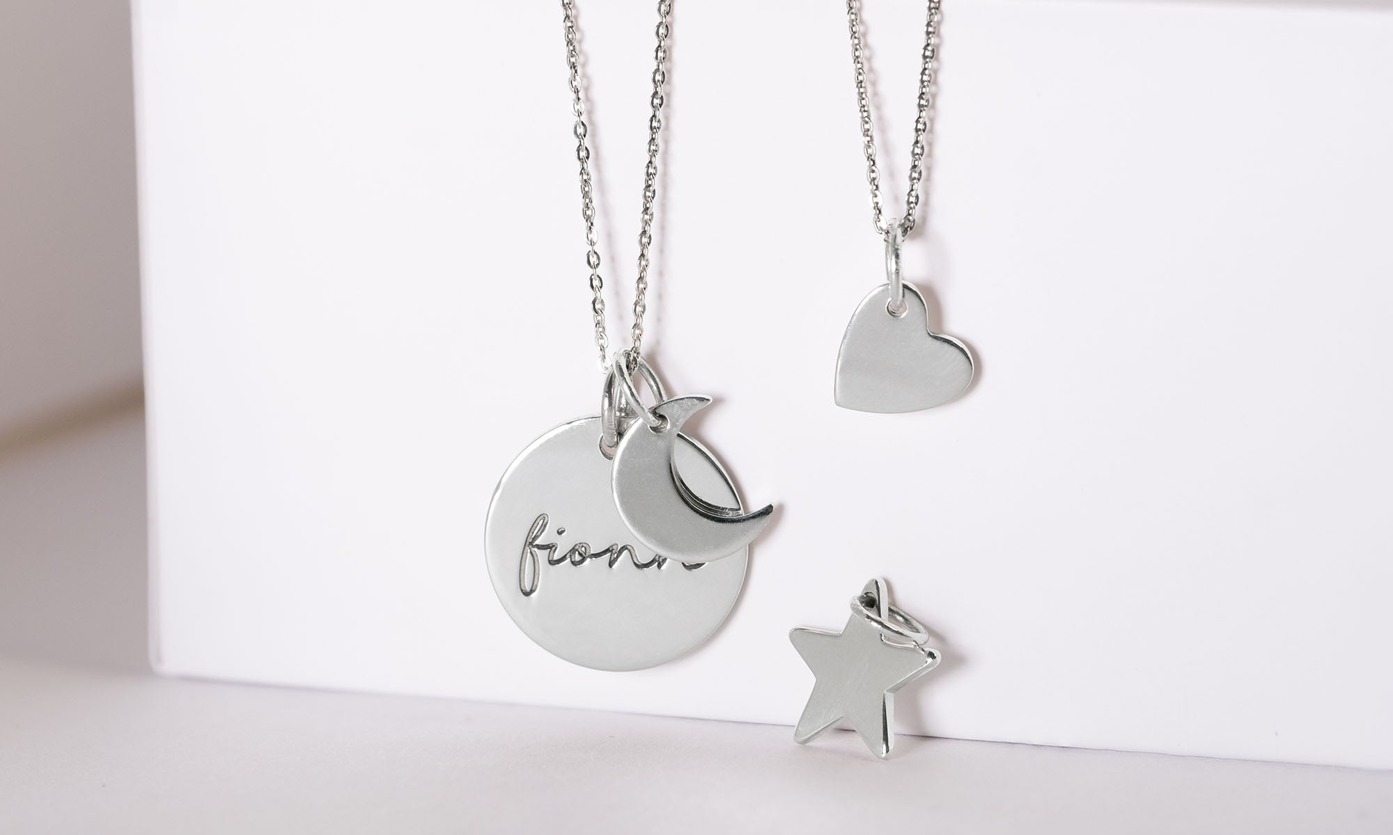 Silver disc necklace and charms