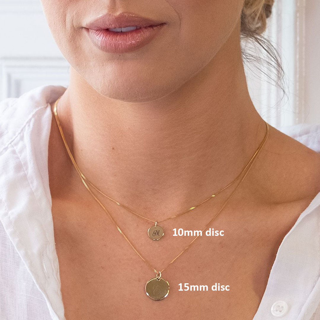 10mm and 15mm disc pendants shown on model