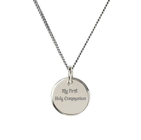 Silver disc pendant engraved with 'My First Holy Communion'