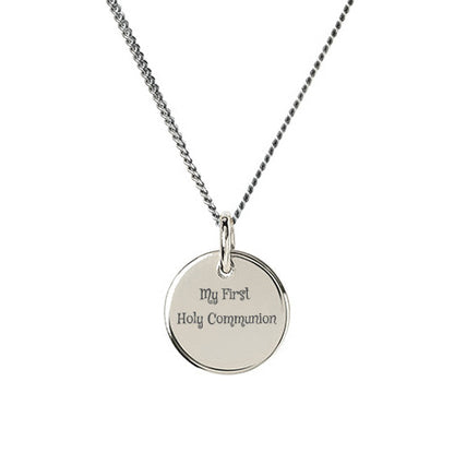 Silver disc pendant engraved with 'My First Holy Communion'