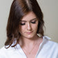 Gold Star Charm Pendant shown on model