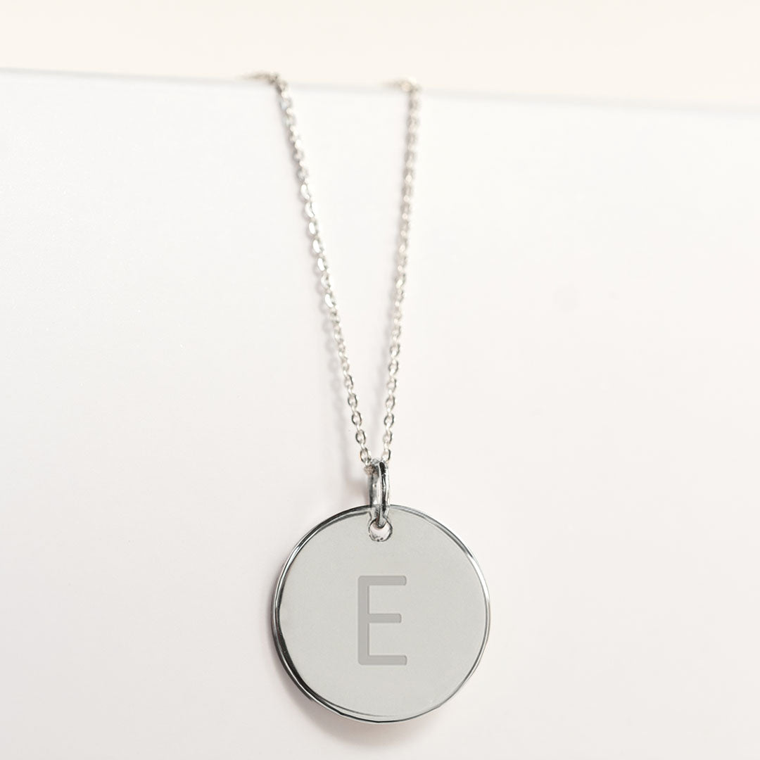 Stirling silver disc pendant necklace engraved with letter E